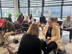 Picture of a room of individuals attending a training session